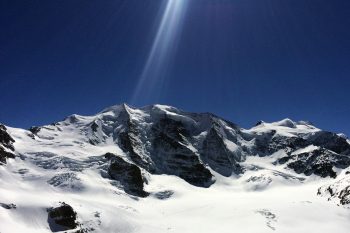 Sonnenstrahl am Piz Palü Gipfel.